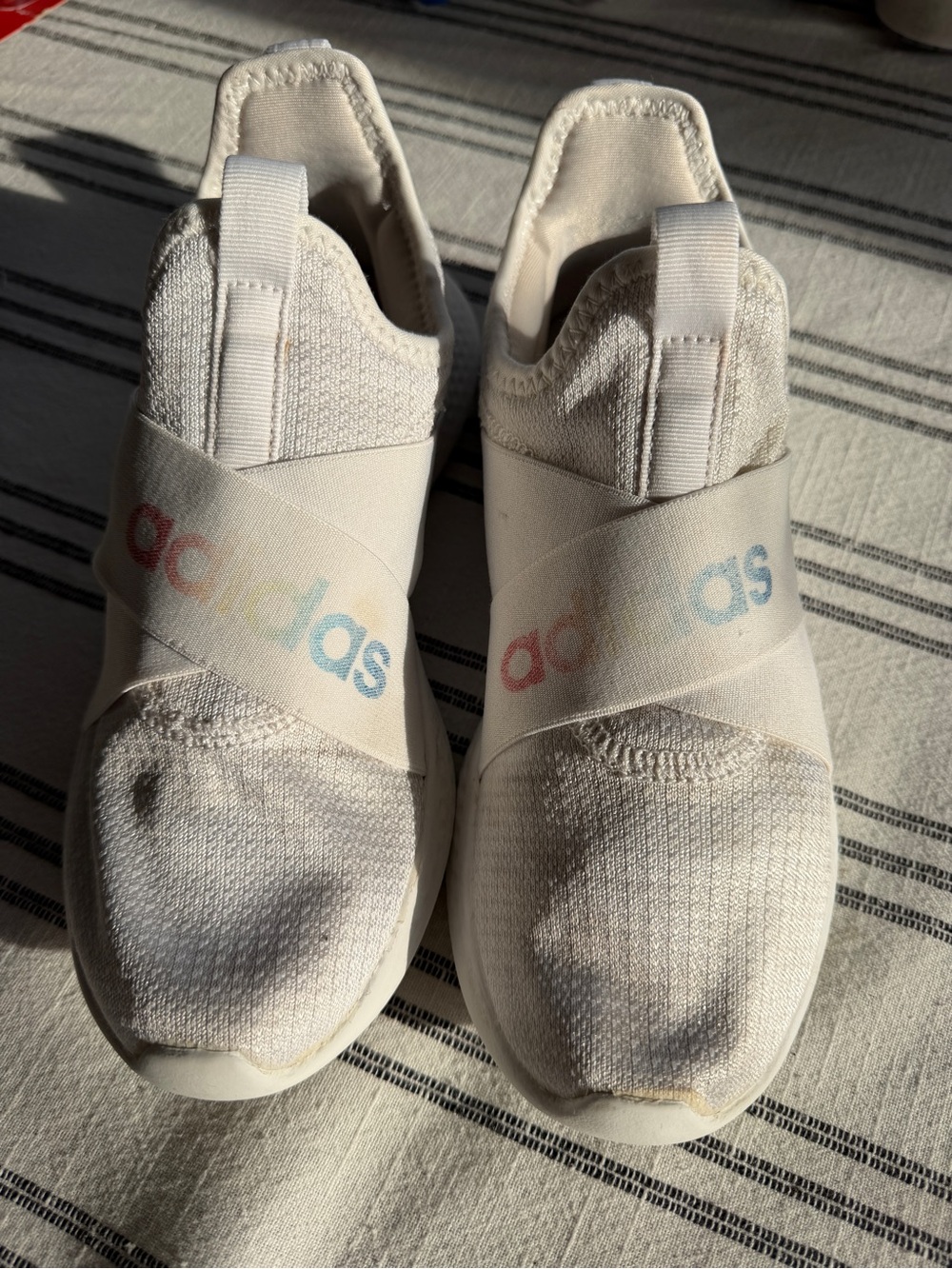 adidas White Slip-On Sneakers with Rainbow Logo Straps